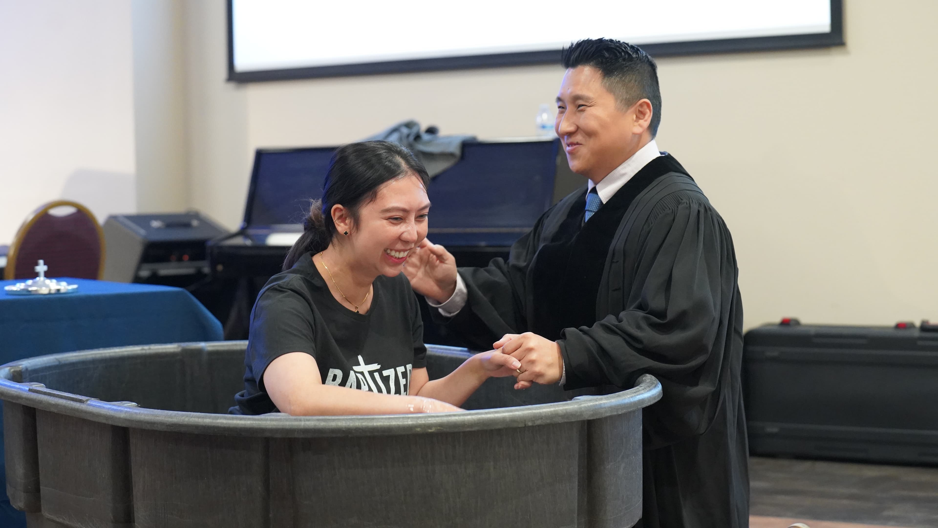 member being baptized